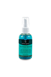 Front view of a Spray bottle of China Glaze nail liquid spray with product label text